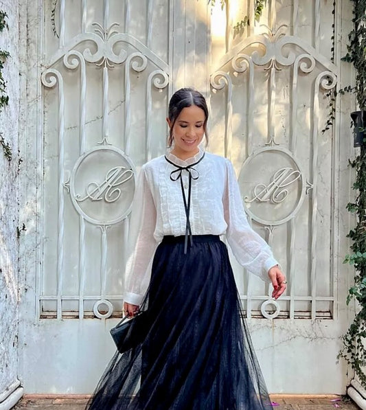 BLUSA VOLANTES Y LAZO